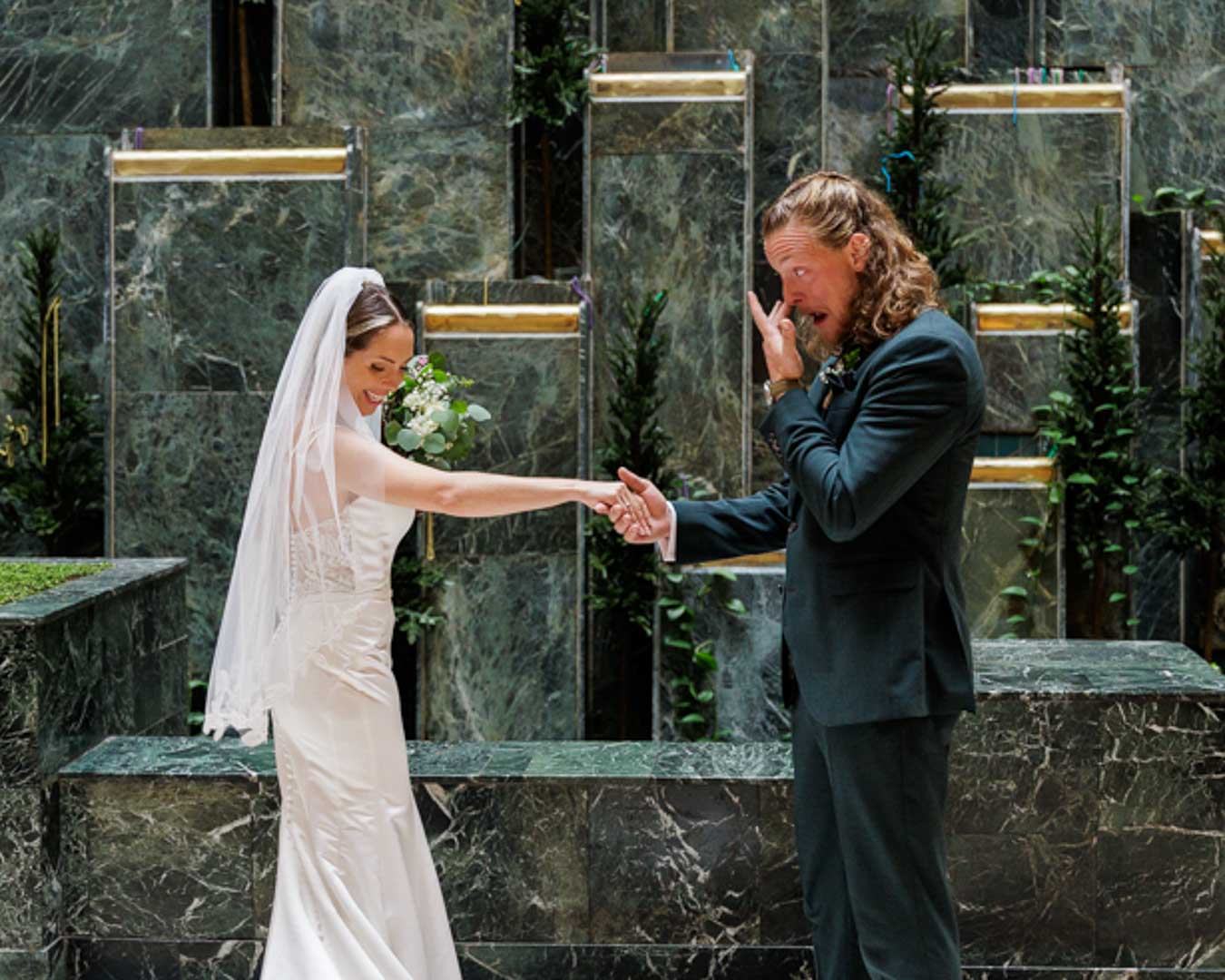 Bride and Groom in Los Angeles, California destination wedding with airplane in background by Olga Gamburg Photography