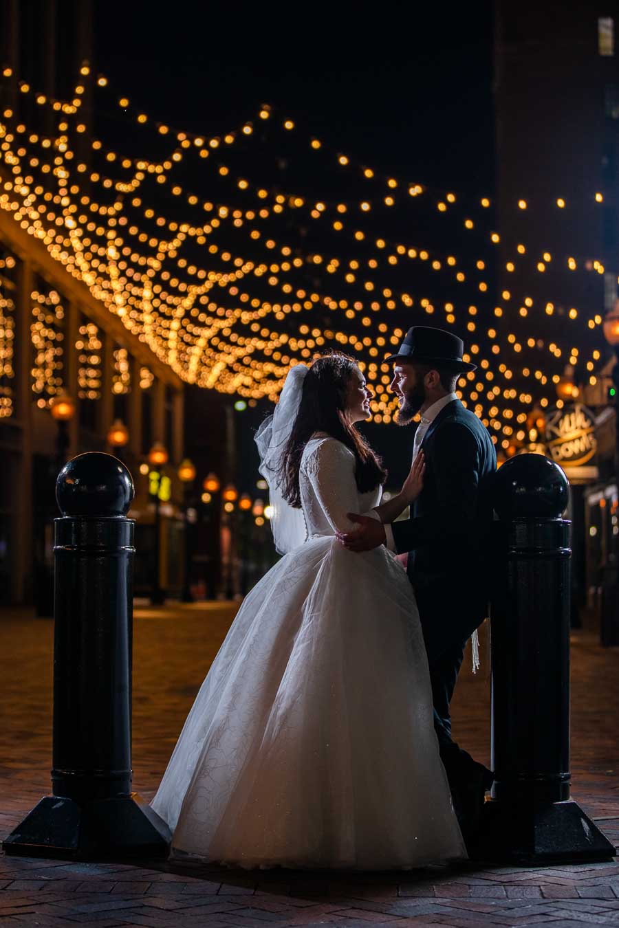 Bride and Groom in Los Angeles, California destination wedding with airplane in background by Olga Gamburg Photography
