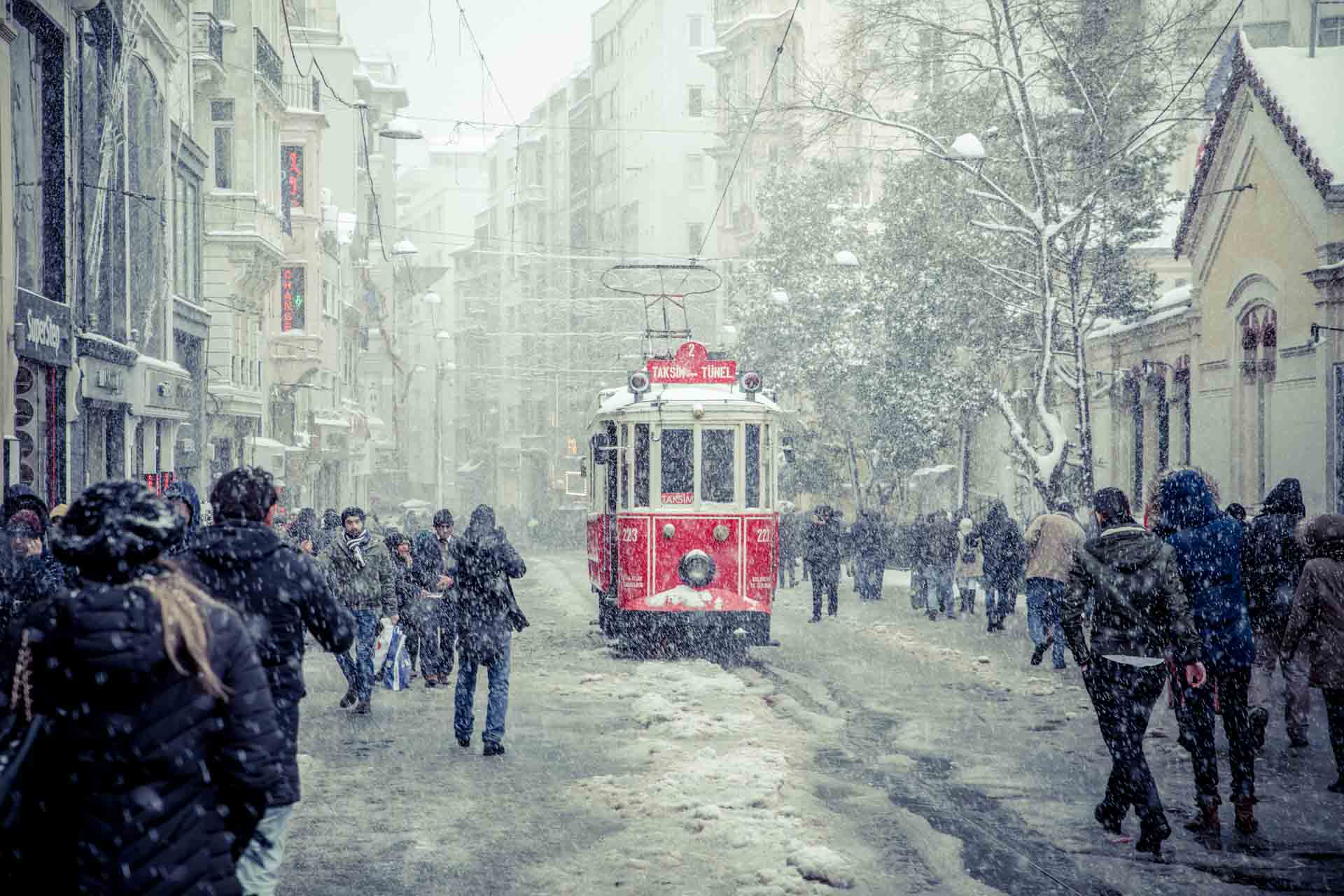 Trolley in Istanbul, Turkey during rare snow storm photo by Olga Gamburg